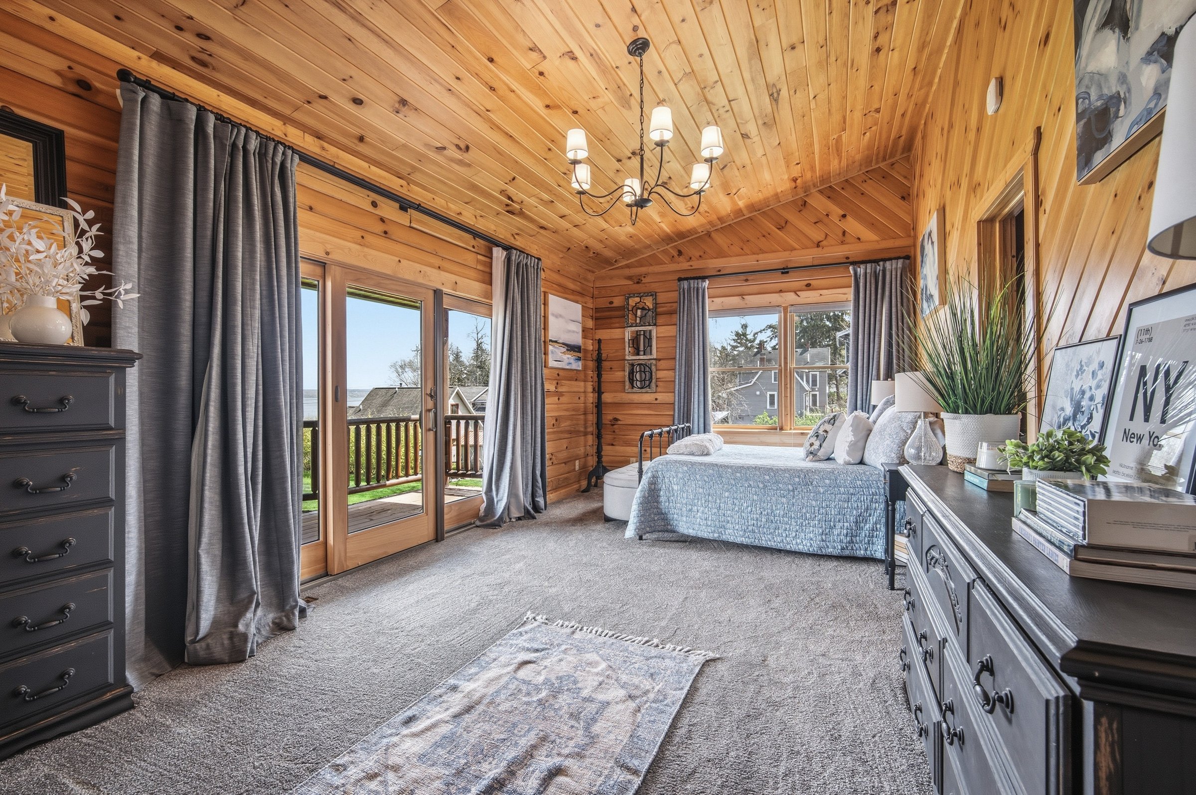 Primary bedroom with french doors to balcony