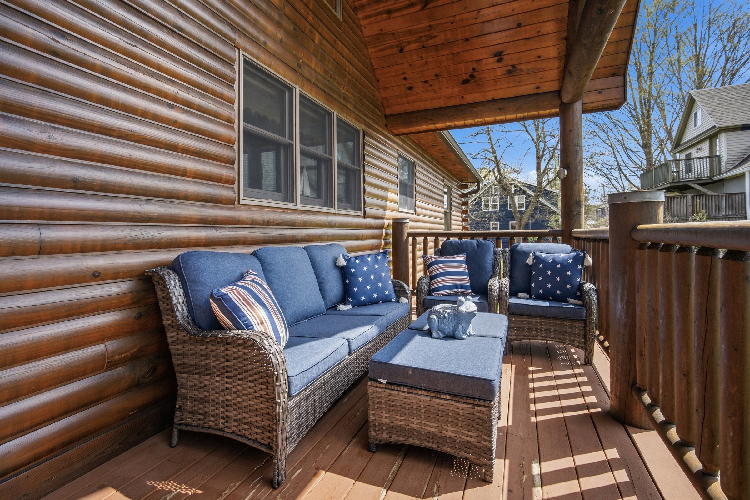 Covered porch with wicker seating